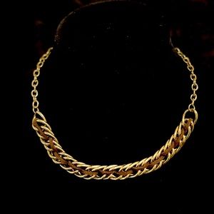 Gold tone and leather necklace